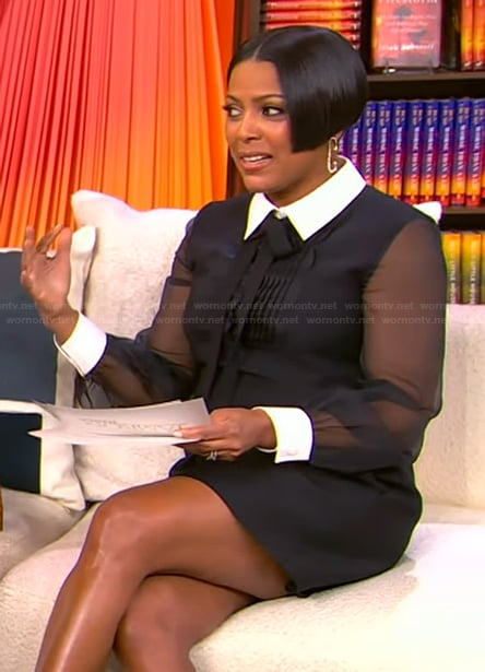 Tamron's black sheer sleeve dress on Tamron Hall Show