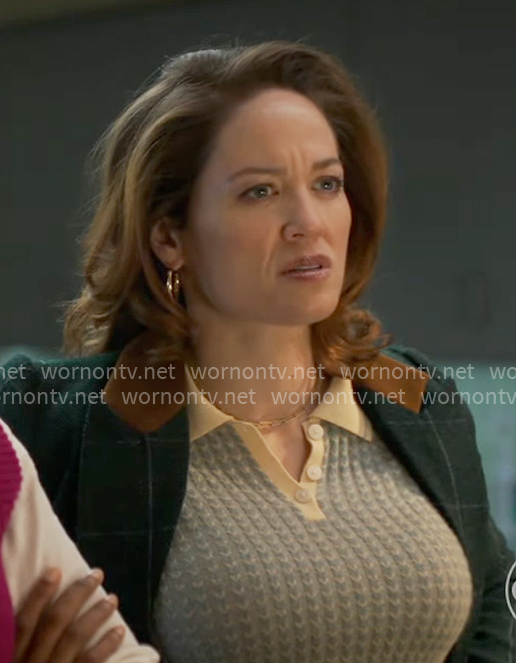 Angie's green knit polo top and plaid blazer on Will Trent