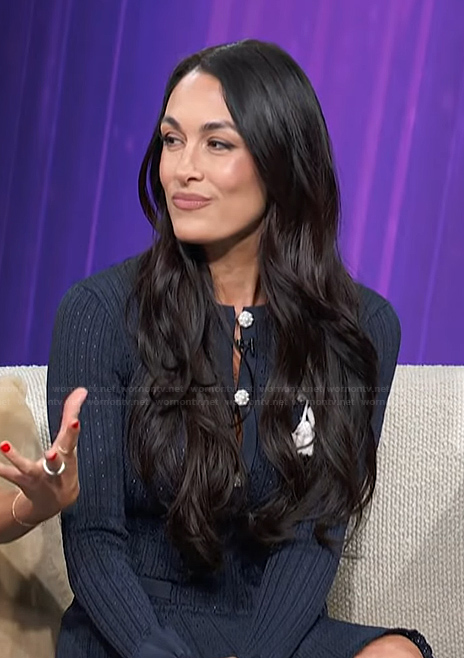 Brie Garcia's navy knit mini dress on Access Hollywood
