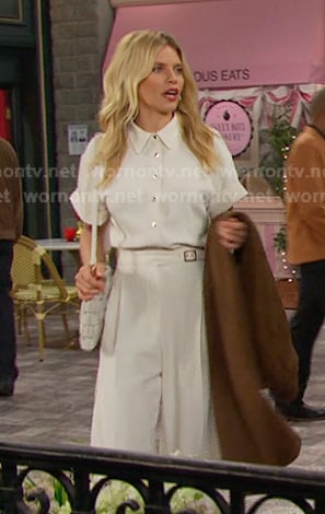 Cat's white short sleeve shirt and belted pants on Days of our Lives