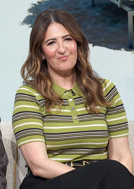 D'Arcy Carden's green striped polo on Access Hollywood