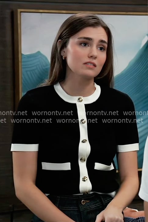 Emma's black short sleeve cardigan with white trims on General Hospital