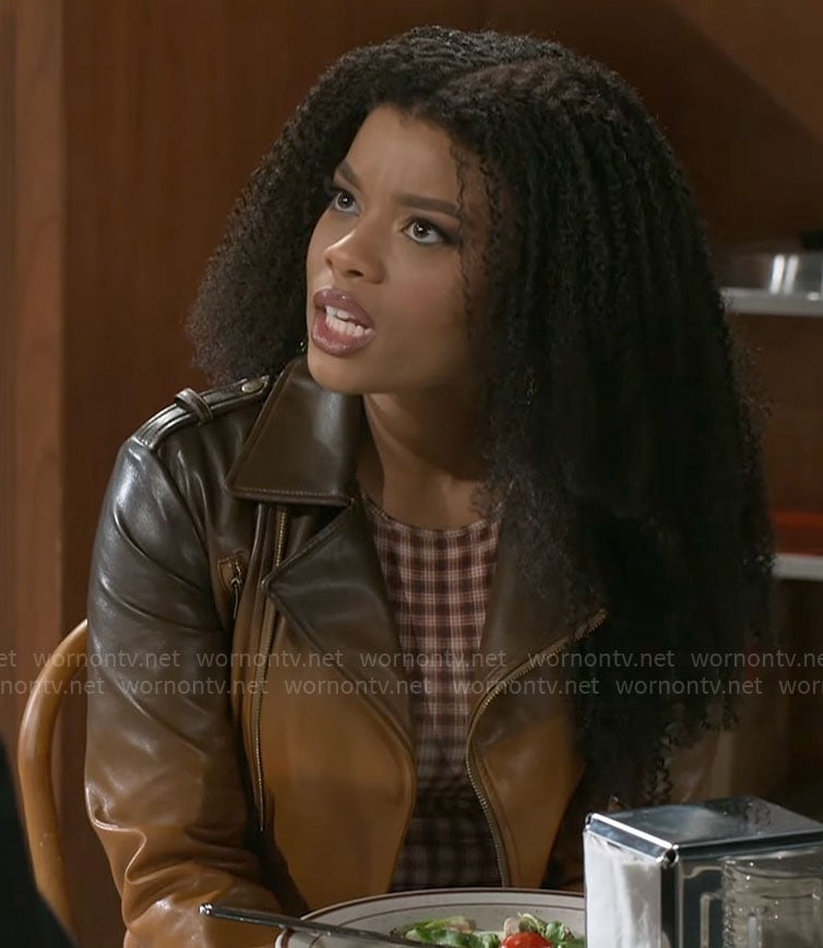 Eva's brown ombre leather jacket and checked top on Beyond the Gates