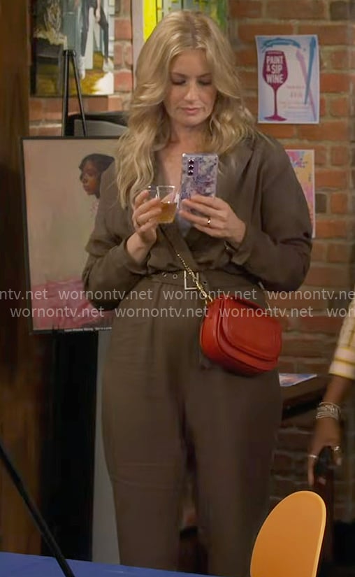 Gemma's olive jumpsuit on The Neighborhood