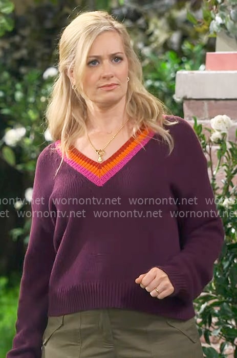 Gemma's plum purple sweater with striped trim on The Neighborhood