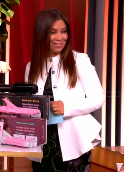 Gretta's white peplum jacket and floral print dress on The View