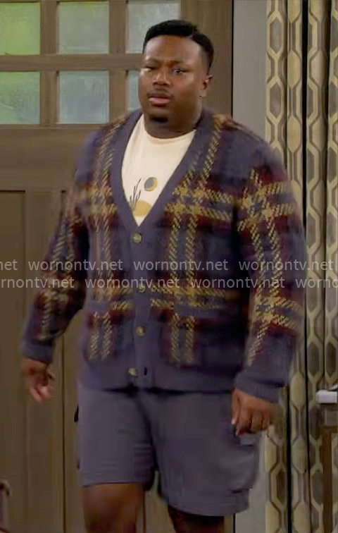 Marty's plaid cardigan on The Neighborhood