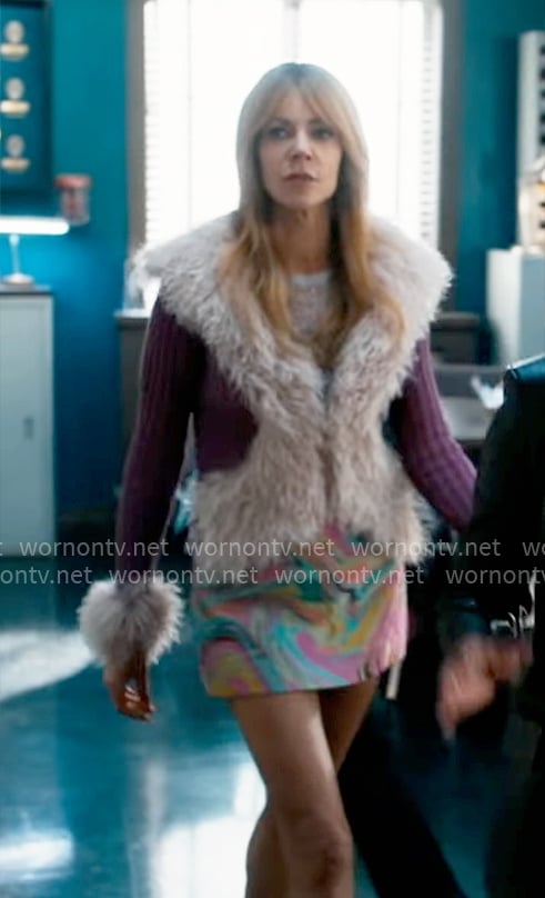 Morgan's purple cardigan with fur trim and marble print skirt on High Potential