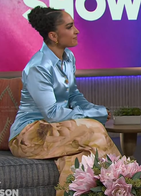 Robin Arzon's blue satin blouse and floral pants on The Kelly Clarkson Show