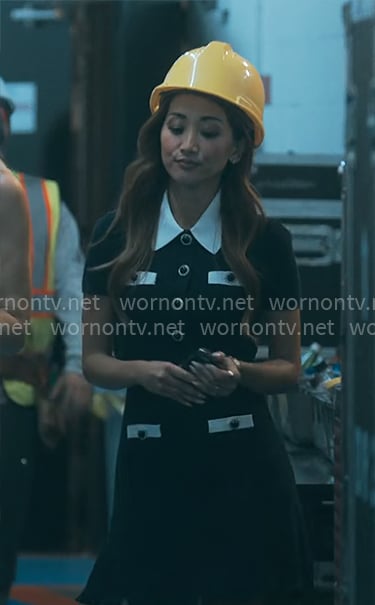 Ali's navy dress with white collar and buttons on Running Point