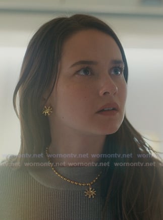 Ashley's gold necklace and earrings on Beef