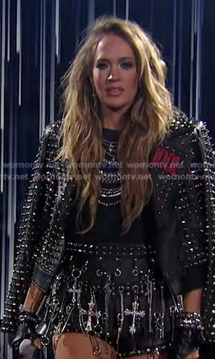 Carrie's black studded leather moto jacket and shorts on American Idol