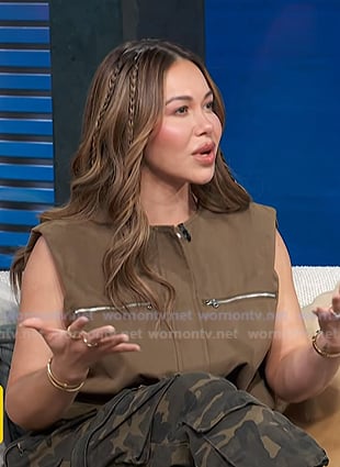 Chiquis Rivera's brown zipped vest on Access Hollywood