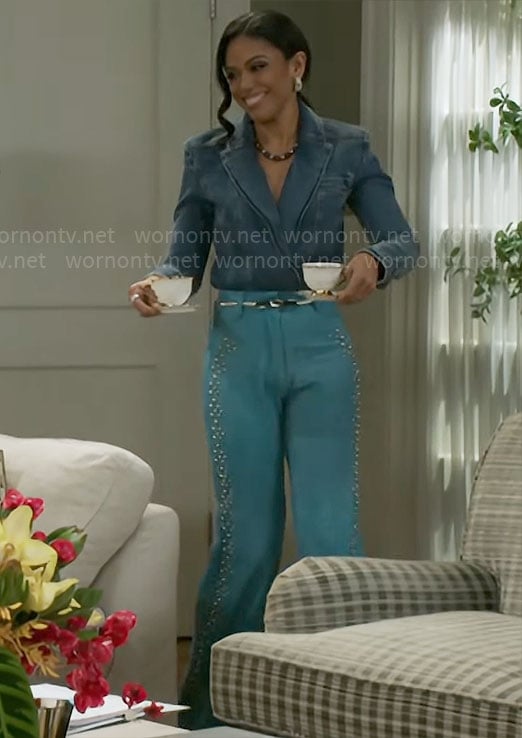 Dani's denim top and blue studded pants on Beyond the Gates
