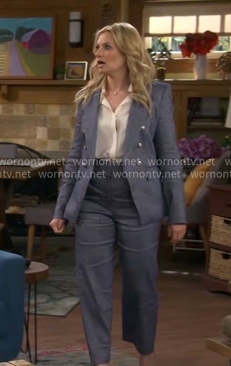 Gemma's blue suit with silver buttons on The Neighborhood