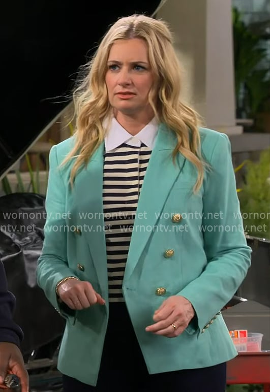Gemma's striped top and aqua green blazer on The Neighborhood