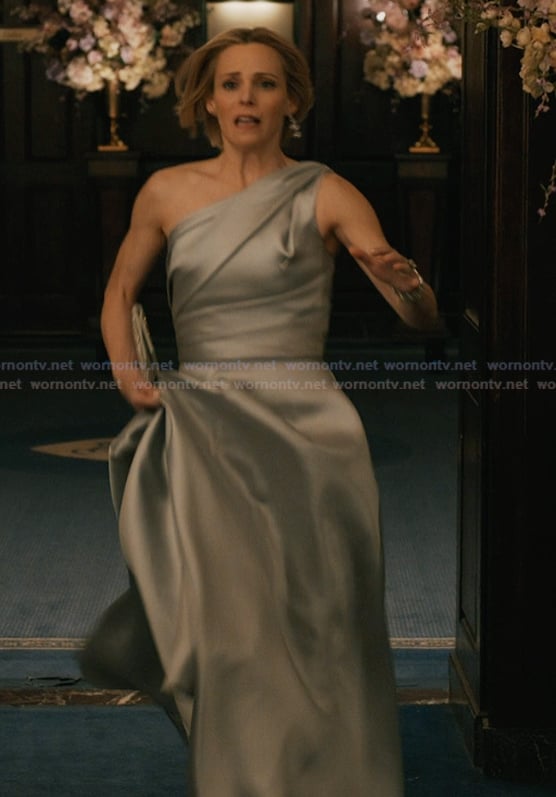 Gwen's gray one shoulder gown on Elsbeth