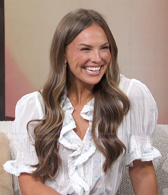 Hanna Brown's white embroidered ruffle top on Access Hollywood