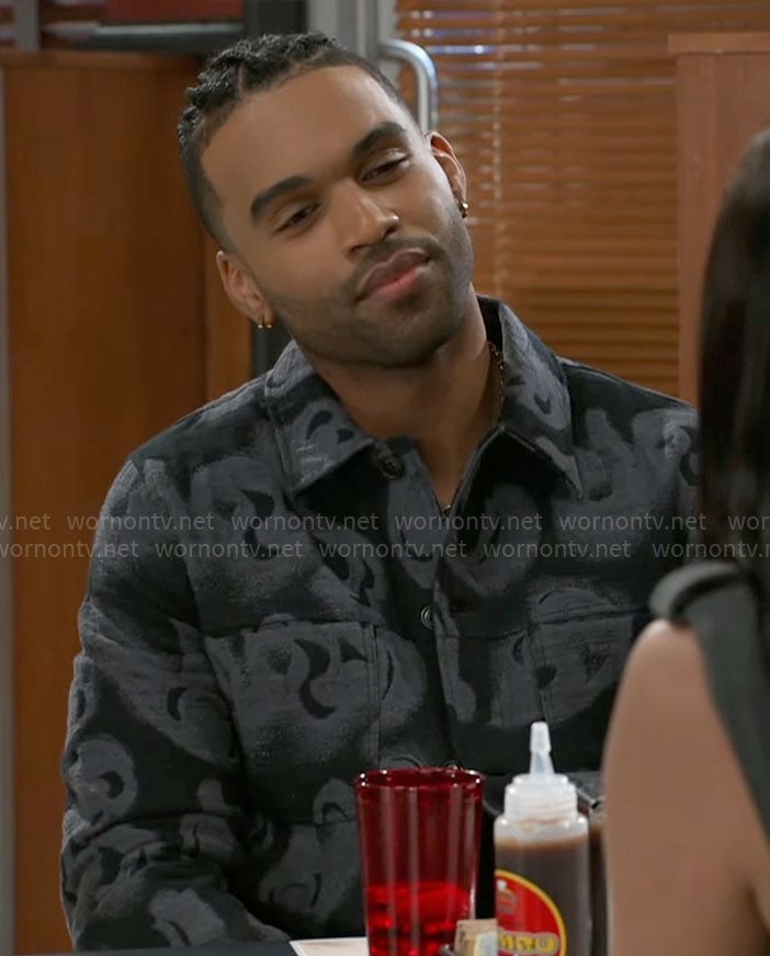 Izaiah's black and grey printed jacket on Beyond the Gates