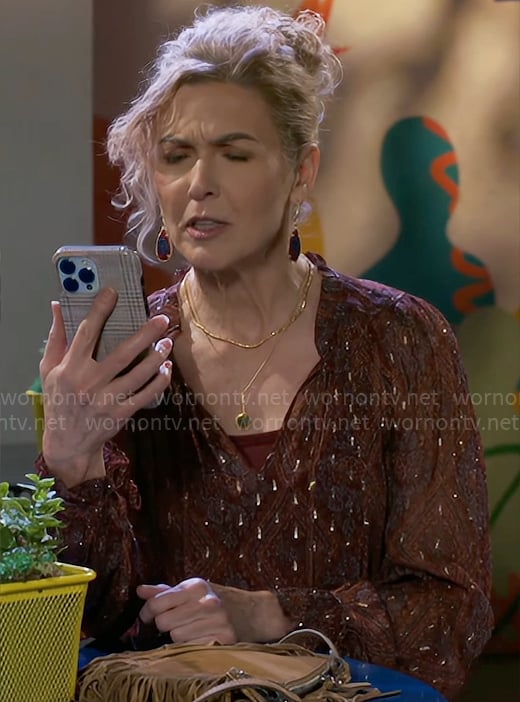 Jan's red printed blouse and fringed bag on Beyond the Gates