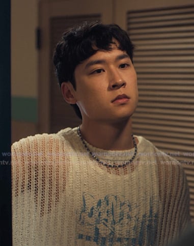 Jin's white open knit sweater on XO Kitty