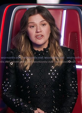 Kelly's black grommet mini dress on The Voice