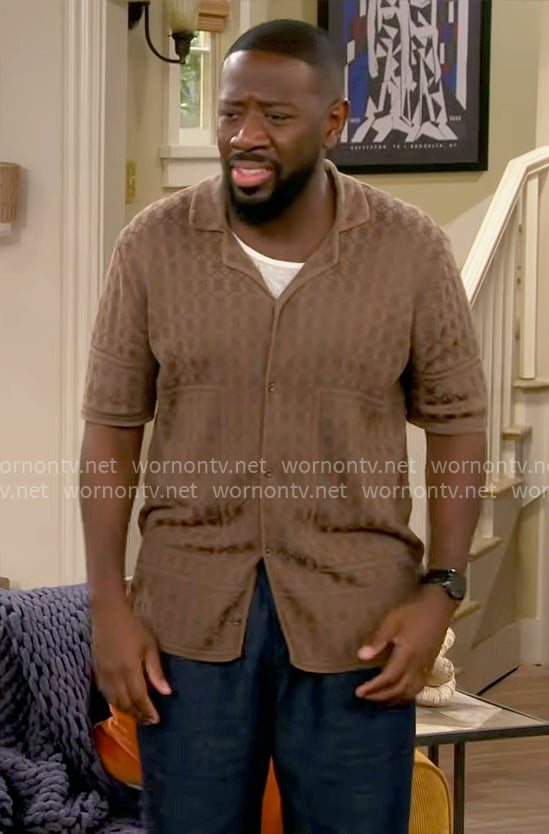 Malcolm's olive green printed button down shirt on The Neighborhood