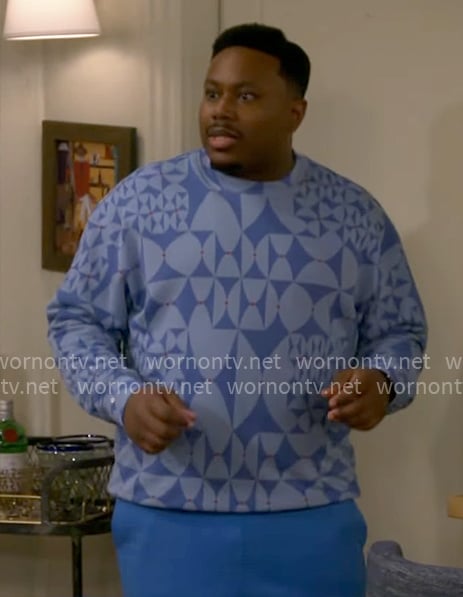 Marty's blue geometric sweater on The Neighborhood