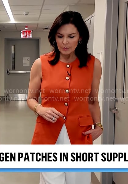 Meg Oliver's orange vest top on CBS Mornings