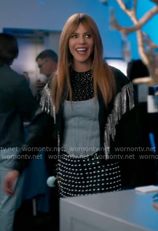 Morgan's black embellished top, denim corset and studded skirt on High Potential