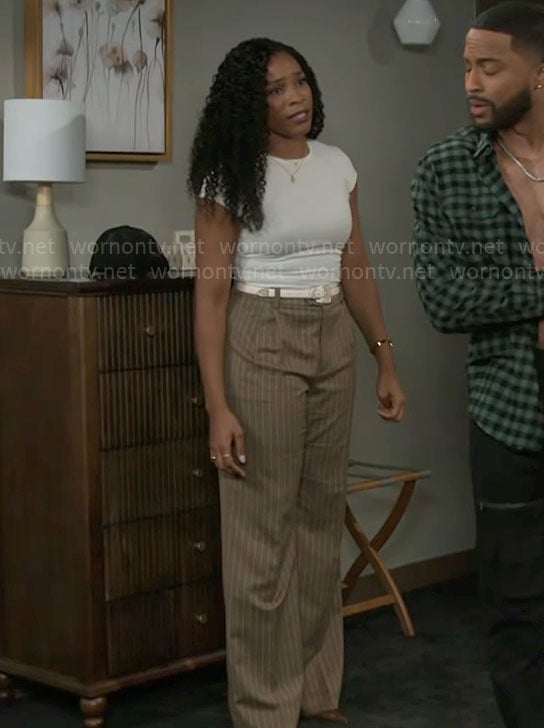 Naomi's beige pinstripe pants on Beyond the Gates