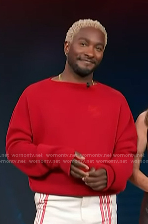 Scott's red logo embroidered sweater on Access Hollywood