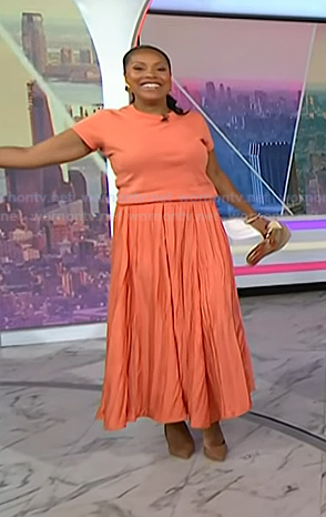 Sheinelle's orange tee and crinkled skirt on Today