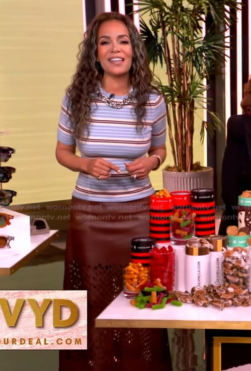 Sunny's blue striped chain neck top and skirt on The View