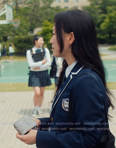 Yuri's metallic wallet on XO Kitty