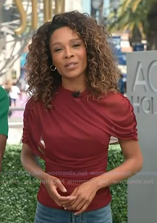 Zuri's red gathered top on Access Hollywood