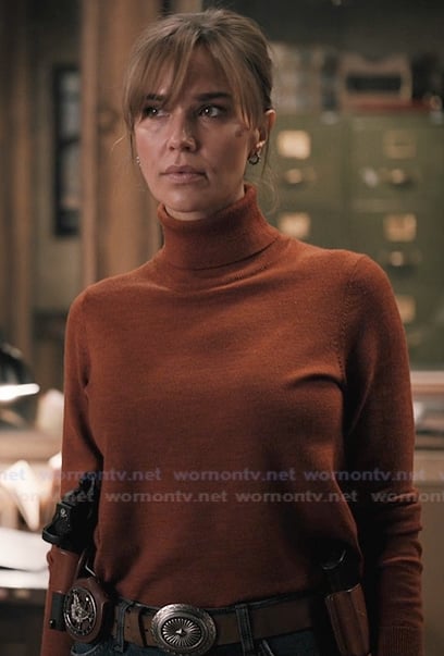 Belle's red turtleneck sweater on Marshals