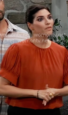 Brook Lynn's red puff sleeve top on General Hospital