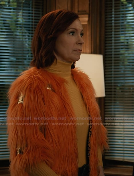 Elsbeth's orange fur star embellished jacket on Elsbeth