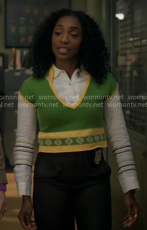 Faith's white shirt and green knit top on Will Trent