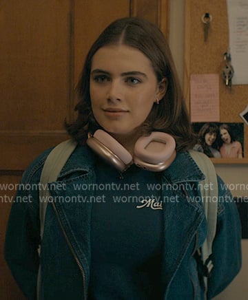 Hannah's denim jacket on pink headphones on Off Campus