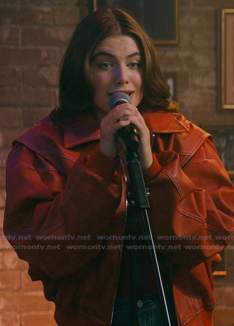 Hannah's red jacket and corset top on Off Campus