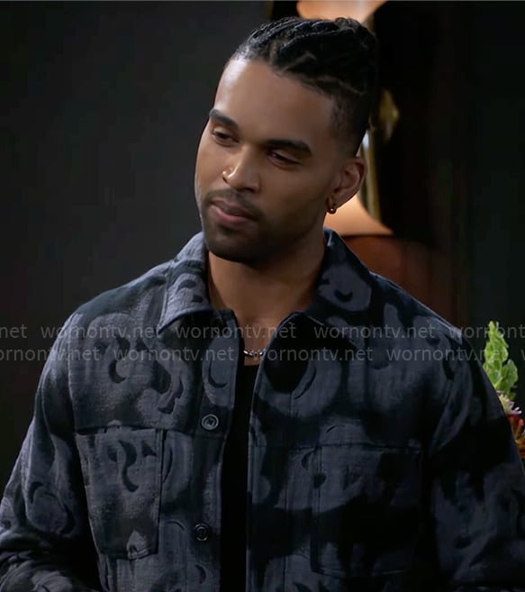 Izaiah's black and grey printed jacket on Beyond the Gates