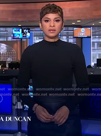 Jericka's black ribbed top and leather skirt on CBS Evening News