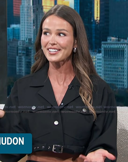 Jocelyn Hudon's black belted jacket on Access Hollywood