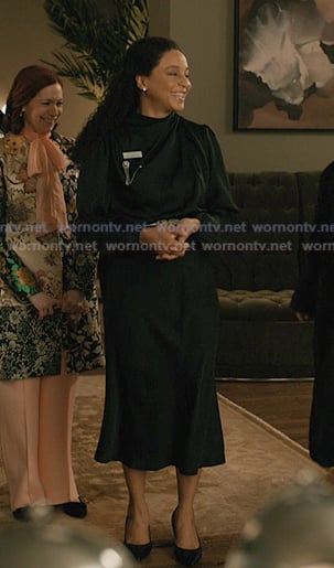 Kaya's black satin midi dress on Elsbeth
