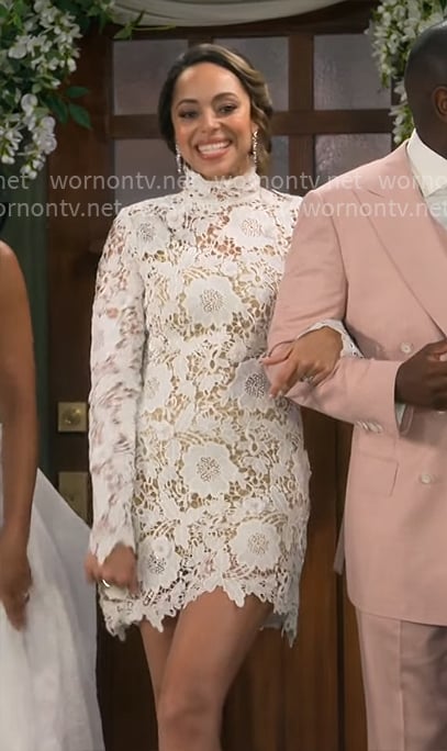 Mercedes' mini lace wedding dress on The Neighborhood