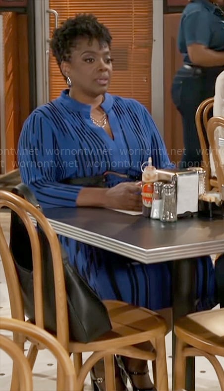 Mona's blue dress on Beyond the Gates