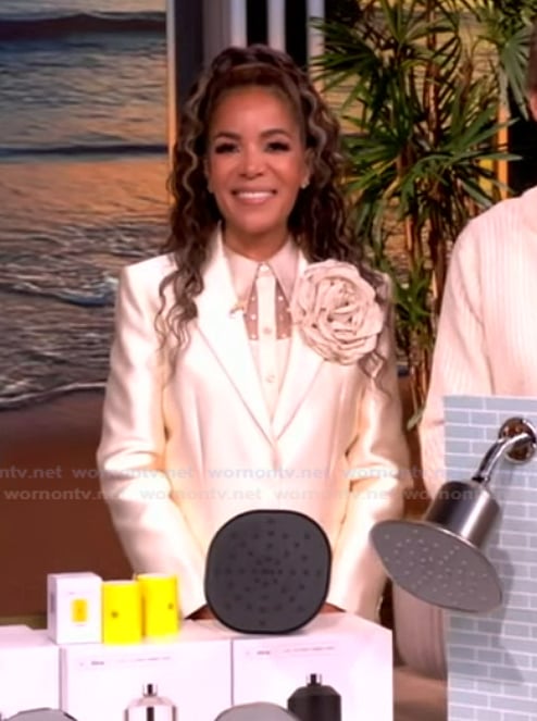 Sunny's lace blouse and floral blazer on The View