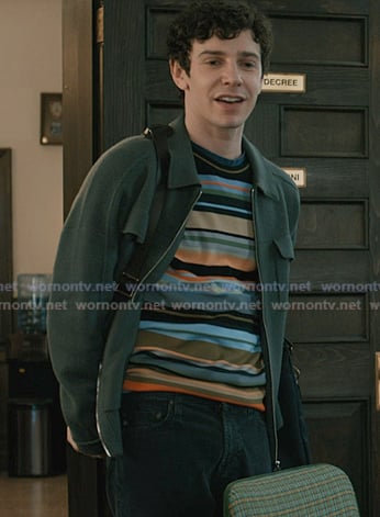 Teddy's multicolor stripe sweater and green zip jacket on Elsbeth